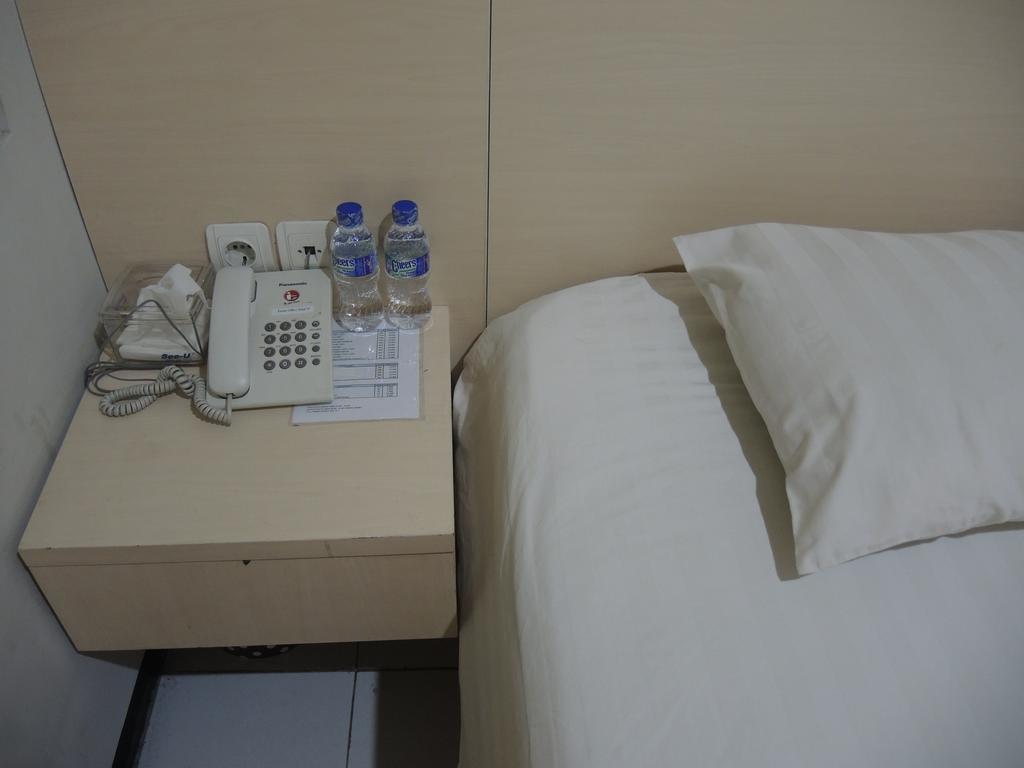 Swk 95 Hotel Сурабая Номер фото